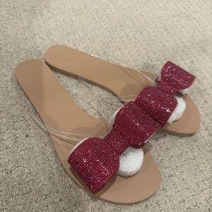 Aminah Abdul Jillil pink crystal flip flops